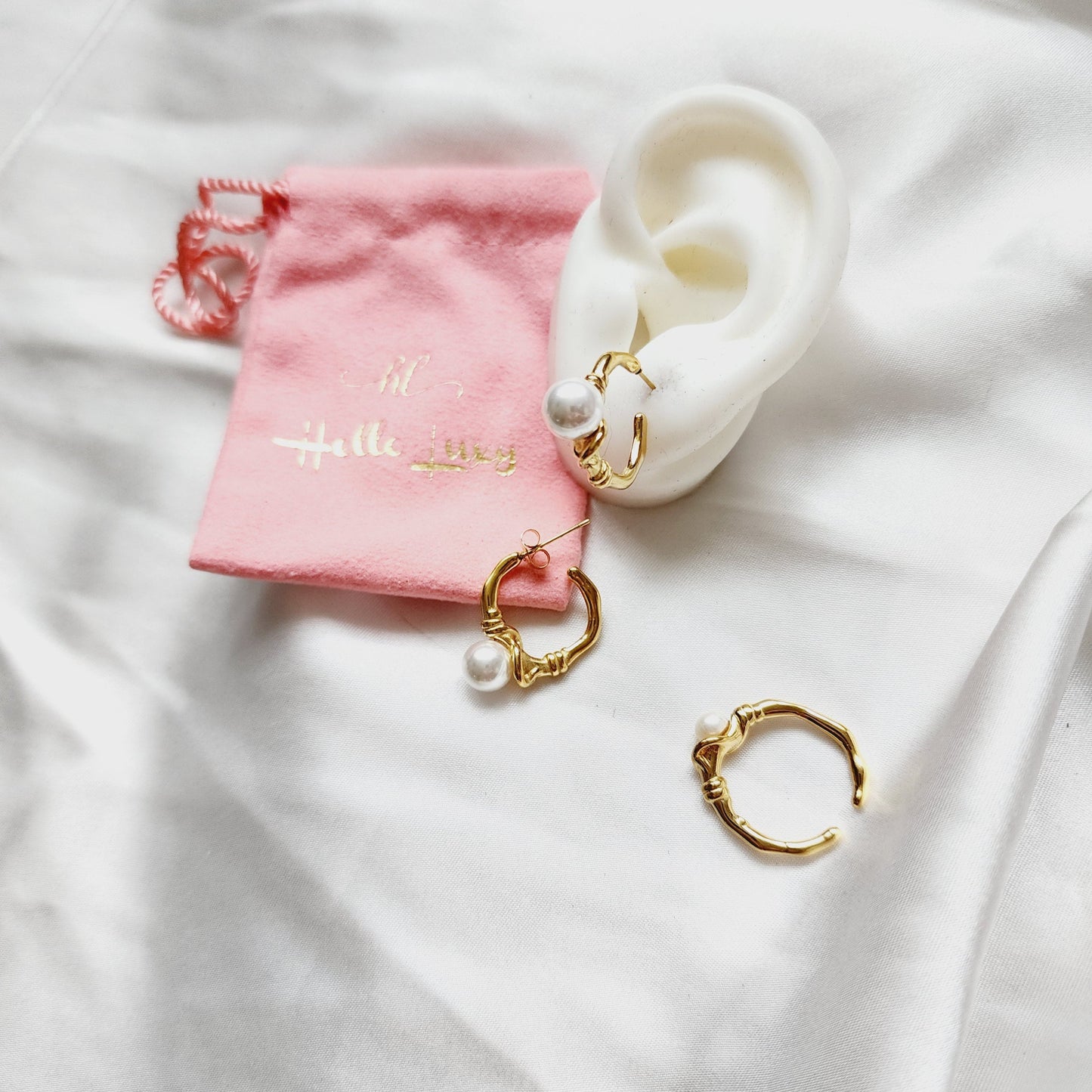 pearl earrings for women, pearl earrings and ring, gold pearl earrings, gold pearl earrings for bride, gold pearl ring, golden pearl rings for women, Abstract golden pearl earrings, Ear bone clip, gold ear bone clip, gold ear hole earrings, Water resistant gold hoops, tarnish free gold open hoops, Lightweight Chunky Open Hoops