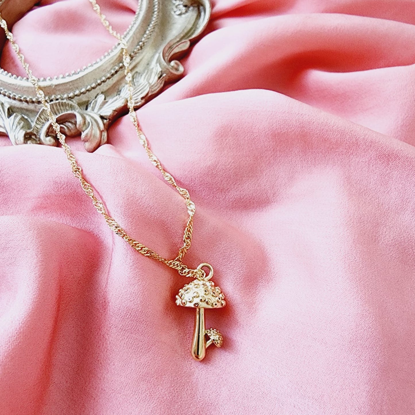 Keywords: Mushroom Gold Necklace, minimalist charm, delicate, simplicity, elegance, understated beauty, dainty pendant, growth, harmony, resilience, water-resistant, high-quality, tarnish-resistant, gold-plated stainless steel, longevity, durability, sleek design, versatile, day to night, casual, formal, must-have accessory, water-resistant, radiant, untarnished, exquisite, thoughtful gift, minimalist beauty.