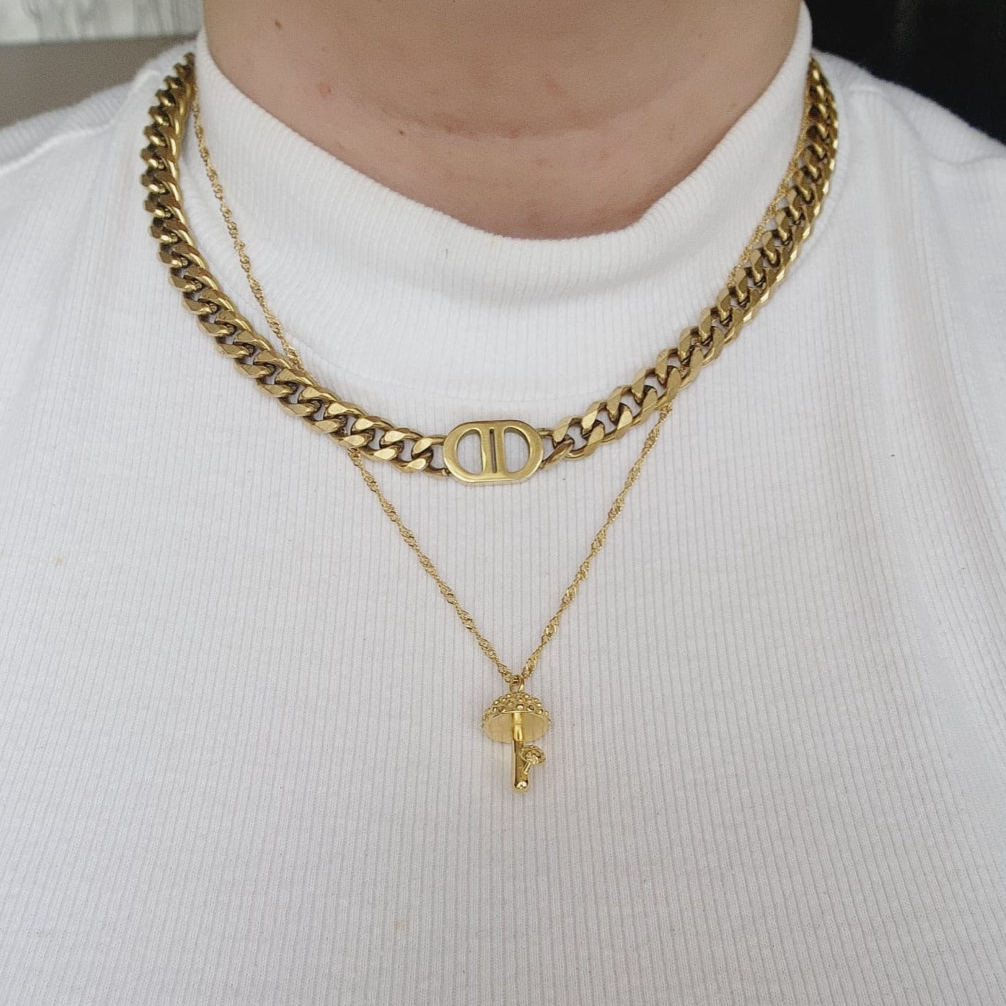 Keywords: Mushroom Gold Necklace, minimalist charm, delicate, simplicity, elegance, understated beauty, dainty pendant, growth, harmony, resilience, water-resistant, high-quality, tarnish-resistant, gold-plated stainless steel, longevity, durability, sleek design, versatile, day to night, casual, formal, must-have accessory, water-resistant, radiant, untarnished, exquisite, thoughtful gift, minimalist beauty.