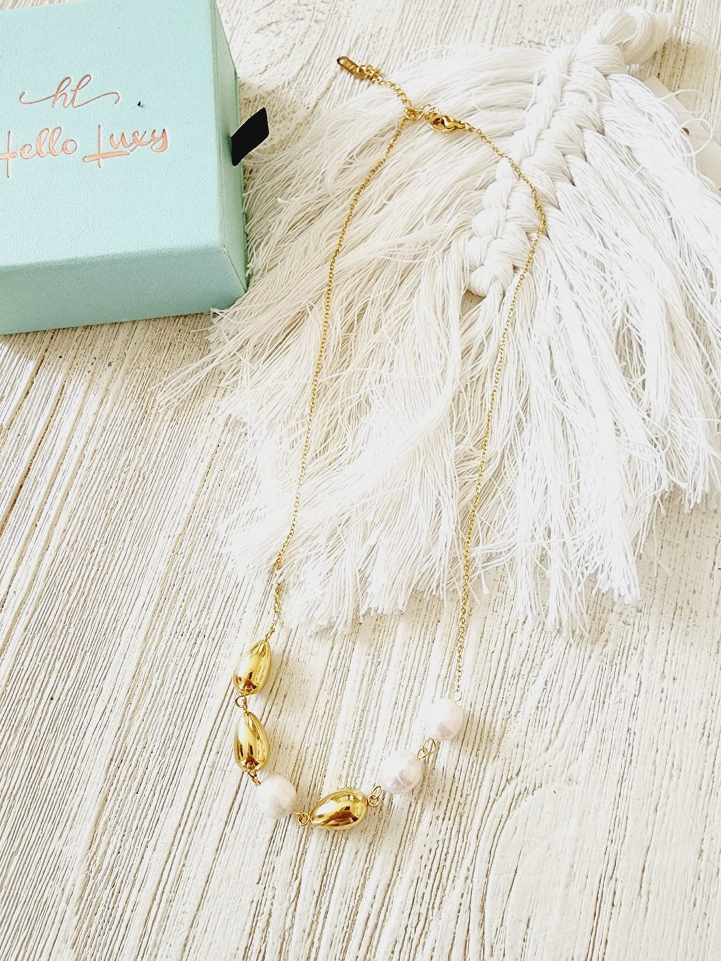 Pearls Gold Necklace, minimalist charm, delicate, simplicity, elegance, understated beauty, dainty pendant, baroque pearls necklace, water-resistant, high-quality, tarnish-resistant, gold-plated stainless steel, longevity, durability, sleek design, versatile, day to night, casual, formal, must-have accessory, water-resistant, radiant, untarnished, exquisite, thoughtful gift, minimalist beauty.