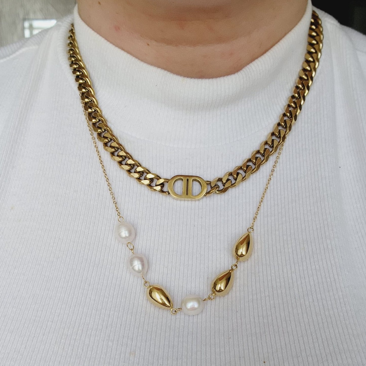 Pearls Gold Necklace, minimalist charm, delicate, simplicity, elegance, understated beauty, dainty pendant, baroque pearls necklace, water-resistant, high-quality, tarnish-resistant, gold-plated stainless steel, longevity, durability, sleek design, versatile, day to night, casual, formal, must-have accessory, water-resistant, radiant, untarnished, exquisite, thoughtful gift, minimalist beauty.