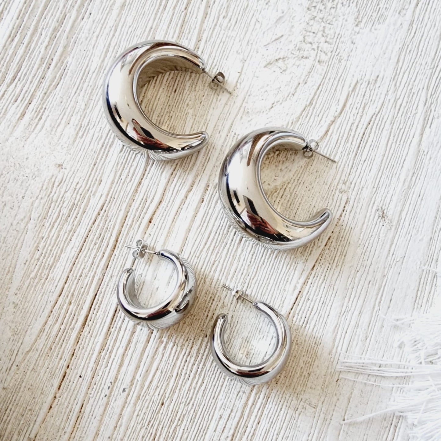 moon hoops, silver hoops, hypoallergenic earrings, Star studs, 18k gold plated earrings, Waterproof earrings, Silver and gold, Durable earrings, Elegant earrings, Timeless design, aesthetic earrings, timeless earrings, Fashion accessories, Stylish jewelry, stylish earrings, Versatile jewelry, Bold Earrings, Bold hoops, chunky hoops, chunky earrings,