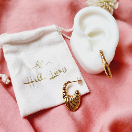 Lightweight hoops, Small Abstract hoops, abstract hoop earrings, hearts silver earrings, hearts silver medium earrings, Silver classy earrings, hearts earrings, self love earrings, silver chunky hearts earrings, two tones chunky earrings, hypoallergenic earrings, two tone everyday hoops, 18k gold plated earrings, Waterproof earrings, Silver and gold earrings, Durable earrings, Elegant earrings, Timeless design, aesthetic earrings, timeless earrings, Stylish jewelry, stylish earrings