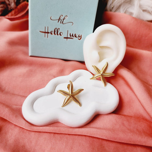 hypoallergenic earrings, Star studs, 18k gold plated earrings, Waterproof earrings, Silver and gold, Durable earrings, Elegant earrings, Timeless design, aesthetic earrings, timeless earrings, Fashion accessories, Stylish jewelry, stylish earrings, Versatile jewelry, Special occasion jewelry, Everyday earrings, Premium quality studs, Affordable luxury Hypoallergenic earrings waterproof earrings, water resistant earrings, silver studs, gold studs