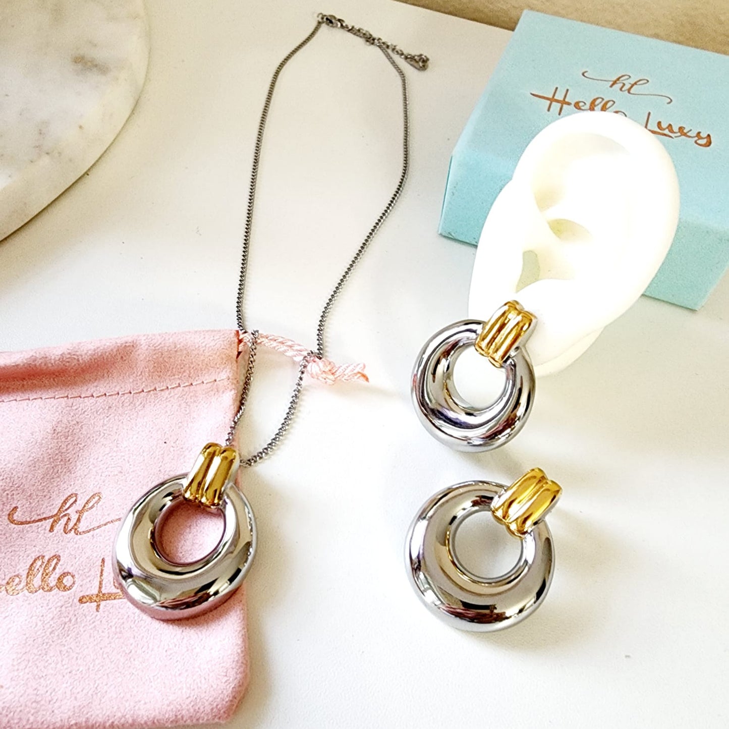 Geometric two tone necklace and earrings, bold two tone circular necklace and earrings, chunky two tone necklace and earrings, infinity necklace and earrings, Fashion Threaded Swirl Shell Pendant Necklace - Steel Stainless Steel Threaded Swirl Shell Necklace, Silver Geometric necklace and earrings, Gold Geometric necklace and earrings
Water Resistant Necklace
Water Resistant Jewelry
Water Resistant
water resistance jewelry