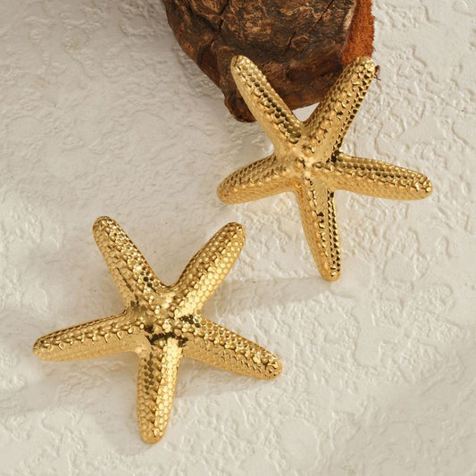 hypoallergenic earrings, Star studs, 18k gold plated earrings, Waterproof earrings, Silver and gold, Durable earrings, Elegant earrings, Timeless design, aesthetic earrings, timeless earrings, Fashion accessories, Stylish jewelry, stylish earrings, Versatile jewelry, Special occasion jewelry, Everyday earrings, Premium quality studs, Affordable luxury Hypoallergenic earrings waterproof earrings, water resistant earrings, silver studs, gold studs