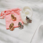 Bold golden studs, chunky golden studs, geometric jewelry, spiral earrings, spiral silver earrings, hearts silver medium earrings, Silver classy earrings, hearts earrings, self love earrings, silver chunky hearts earrings, two tones chunky earrings, hypoallergenic earrings, two tone everyday hoops, 18k gold plated earrings, Waterproof earrings, Silver and gold earrings, Durable earrings, Elegant earrings, Timeless design, aesthetic earrings, timeless earrings, Stylish jewelry, stylish earrings, Versatile je