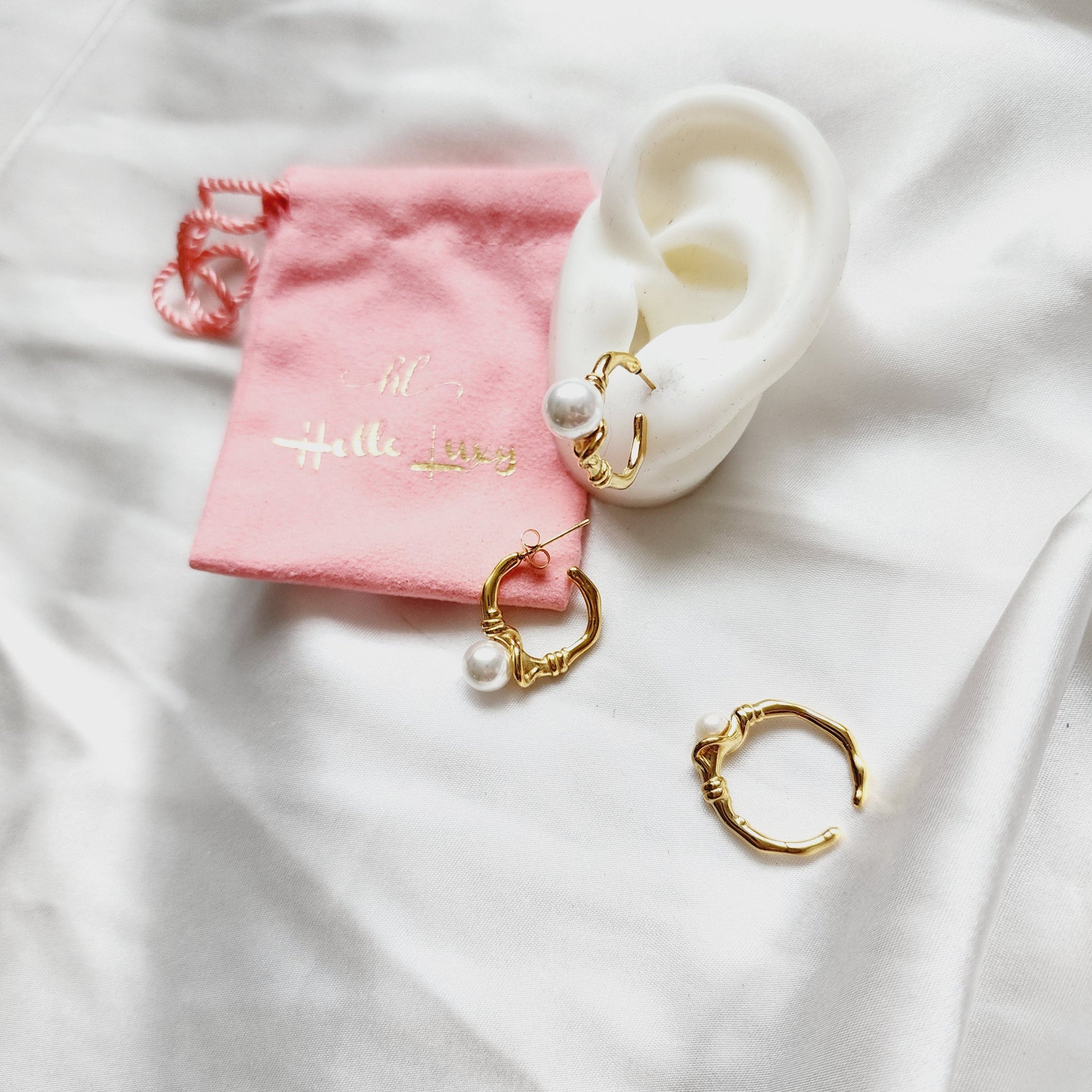 pearl earrings for women, pearl earrings and ring, gold pearl earrings, gold pearl earrings for bride, gold pearl ring, golden pearl rings for women, Abstract golden pearl earrings, Ear bone clip, gold ear bone clip, gold ear hole earrings, Water resistant gold hoops, tarnish free gold open hoops, Lightweight Chunky Open Hoops