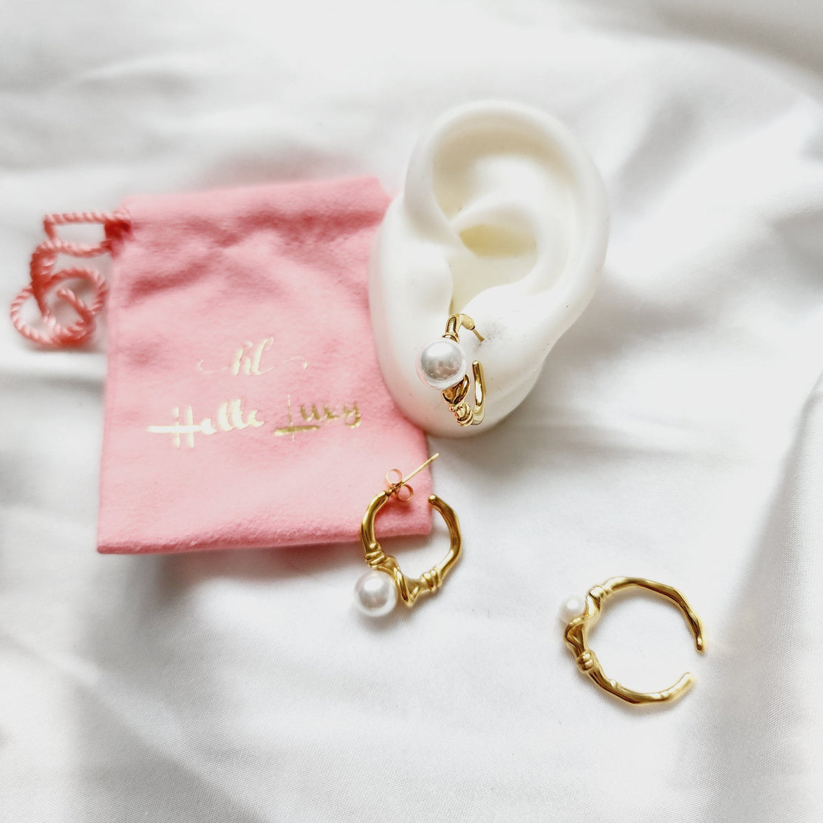 pearl earrings for women, pearl earrings and ring, gold pearl earrings, gold pearl earrings for bride, gold pearl ring, golden pearl rings for women, Abstract golden pearl earrings, Ear bone clip, gold ear bone clip, gold ear hole earrings, Water resistant gold hoops, tarnish free gold open hoops, Lightweight Chunky Open Hoops