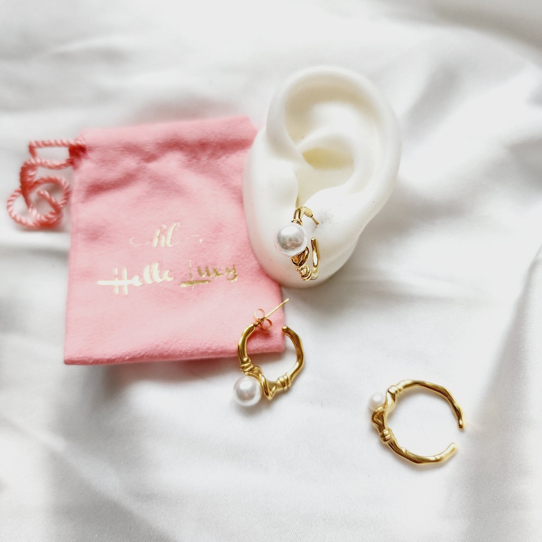 pearl earrings for women, pearl earrings and ring, gold pearl earrings, gold pearl earrings for bride, gold pearl ring, golden pearl rings for women, Abstract golden pearl earrings, Ear bone clip, gold ear bone clip, gold ear hole earrings, Water resistant gold hoops, tarnish free gold open hoops, Lightweight Chunky Open Hoops