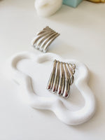 Bold golden studs, bold three tone earrings, bold silver earring, chunky golden studs, geometric jewelry, spiral earrings, spiral silver earrings, hearts silver medium earrings, Silver classy earrings, hearts earrings, self love earrings, silver chunky hearts earrings, two tones chunky earrings, hypoallergenic earrings, two tone everyday hoops, 18k gold plated earrings, Waterproof earrings, Silver and gold earrings, Durable earrings, Elegant earrings, Timeless design, aesthetic earrings, timeless earrings, 