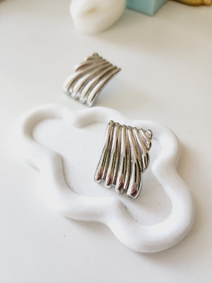 Bold golden studs, bold three tone earrings, bold silver earring, chunky golden studs, geometric jewelry, spiral earrings, spiral silver earrings, hearts silver medium earrings, Silver classy earrings, hearts earrings, self love earrings, silver chunky hearts earrings, two tones chunky earrings, hypoallergenic earrings, two tone everyday hoops, 18k gold plated earrings, Waterproof earrings, Silver and gold earrings, Durable earrings, Elegant earrings, Timeless design, aesthetic earrings, timeless earrings, 
