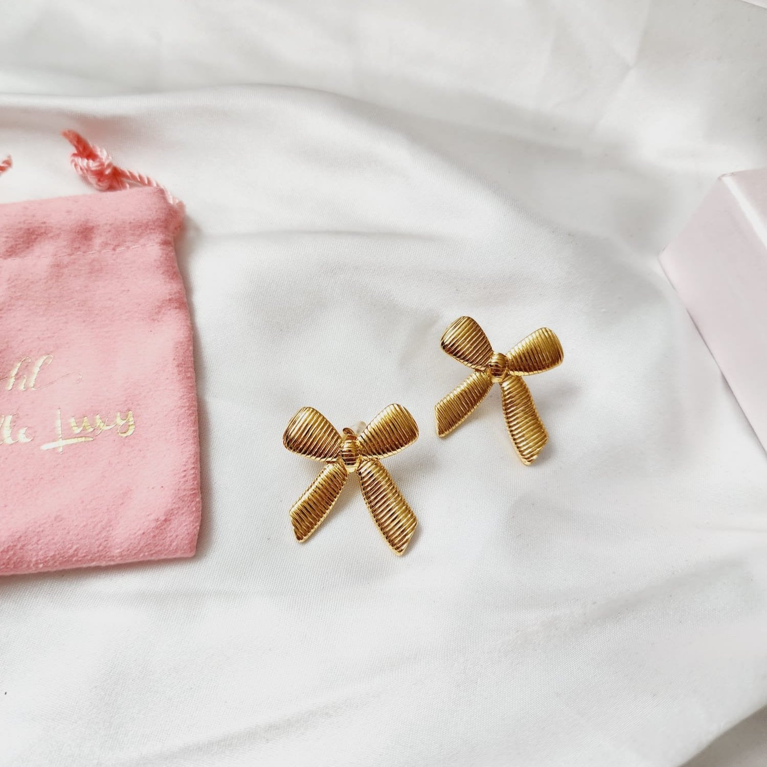 Bow Coquette Earrings, Golden Bow Coquette earrings, Geometrical Studs, Spiral Gold earrings, Spiral Bold Earrings, Bold golden studs, chunky golden studs, self love jewelry, self love earrings, hearts silver earrings, hearts silver medium earrings, Silver classy earrings, hearts earrings, self love earrings, silver chunky hearts earrings, two tones chunky earrings, hypoallergenic earrings, two tone everyday hoops, 18k gold plated earrings, Waterproof earrings, Silver and gold earrings, Durable earrings, El