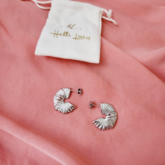 Silver  wavy earrings, lines earrings, Geometrical Studs, Spiral Gold earrings, Spiral Bold Earrings, Bold golden studs, chunky golden studs, self love jewelry, self love earrings, hearts silver earrings, hearts silver medium earrings, Silver classy earrings, hearts earrings, self love earrings, silver chunky hearts earrings, two tones chunky earrings, hypoallergenic earrings, two tone everyday hoops, 18k gold plated earrings, Waterproof earrings, Silver and gold earrings, Durable earrings, Elegant earrings