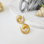 Bold golden studs, chunky golden studs, geometric jewelry, spiral earrings, spiral silver earrings, hearts silver medium earrings, Silver classy earrings, hearts earrings, self love earrings, silver chunky hearts earrings, two tones chunky earrings, hypoallergenic earrings, two tone everyday hoops, 18k gold plated earrings, Waterproof earrings, Silver and gold earrings, Durable earrings, Elegant earrings, Timeless design, aesthetic earrings, timeless earrings, Stylish jewelry, stylish earrings, Versatile je