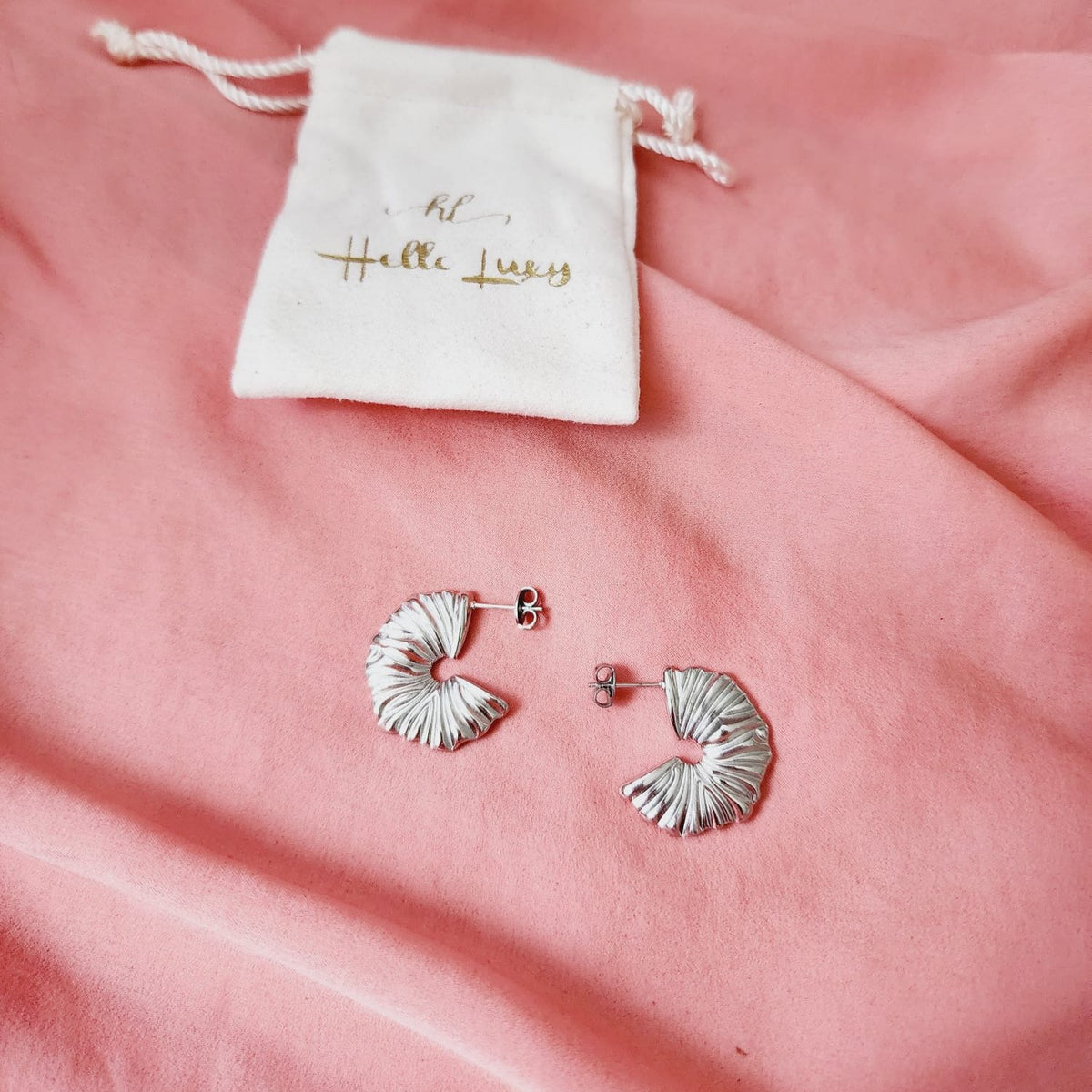 Silver  wavy earrings, lines earrings, Geometrical Studs, Spiral Gold earrings, Spiral Bold Earrings, Bold golden studs, chunky golden studs, self love jewelry, self love earrings, hearts silver earrings, hearts silver medium earrings, Silver classy earrings, hearts earrings, self love earrings, silver chunky hearts earrings, two tones chunky earrings, hypoallergenic earrings, two tone everyday hoops, 18k gold plated earrings, Waterproof earrings, Silver and gold earrings, Durable earrings, Elegant earrings