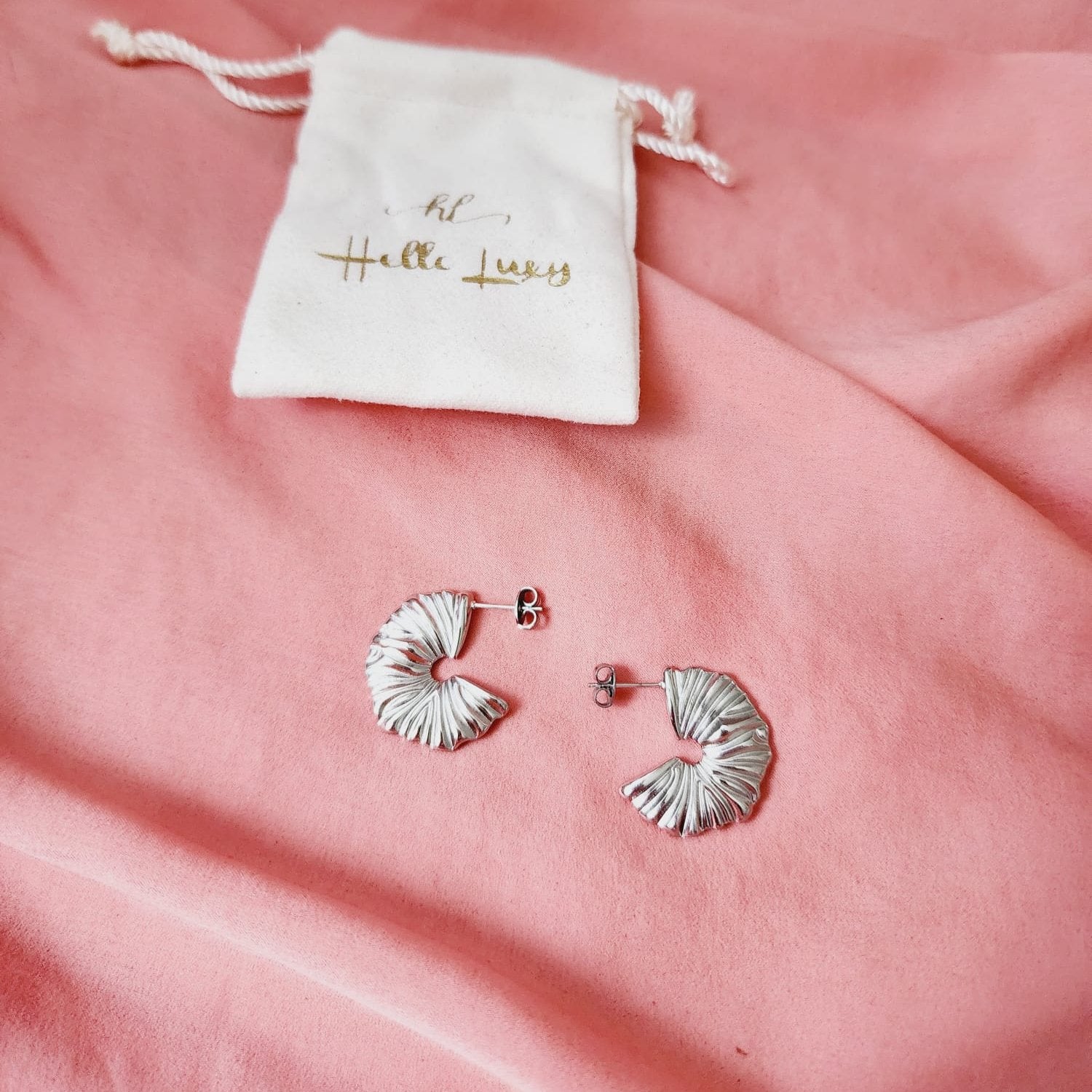 Silver  wavy earrings, lines earrings, Geometrical Studs, Spiral Gold earrings, Spiral Bold Earrings, Bold golden studs, chunky golden studs, self love jewelry, self love earrings, hearts silver earrings, hearts silver medium earrings, Silver classy earrings, hearts earrings, self love earrings, silver chunky hearts earrings, two tones chunky earrings, hypoallergenic earrings, two tone everyday hoops, 18k gold plated earrings, Waterproof earrings, Silver and gold earrings, Durable earrings, Elegant earrings