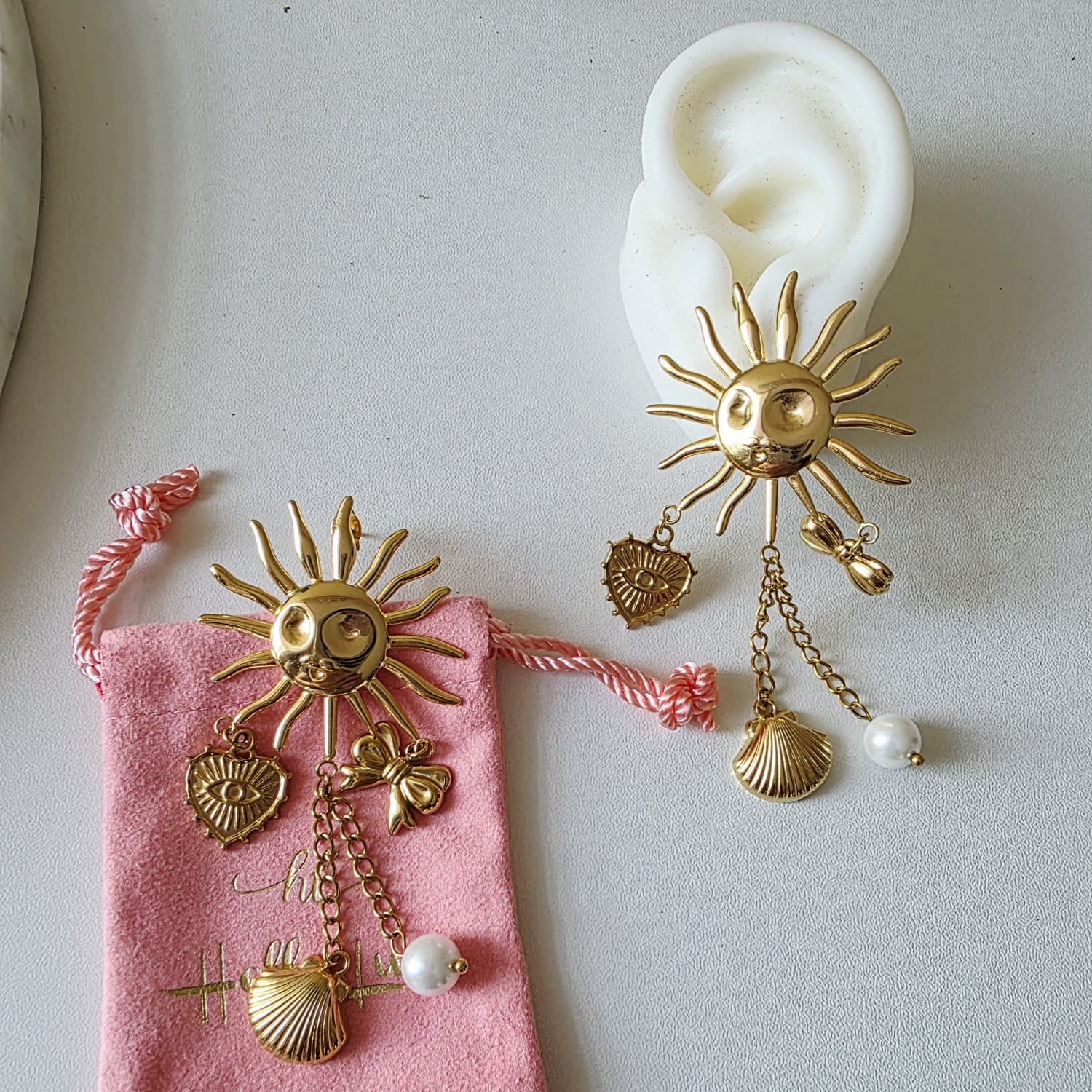 Sun earrings, Gold celestial earrings, Sun and star jewelry, Boho statement earrings,
Unique sun earrings, Sunburst earrings, Celestial jewelry, Star and heart earrings,
Bohemian jewelry style, Gold sun earrings, Dangling celestial earrings, Statement earrings for women, Sun and moon earrings, Vintage-inspired earrings, Spiritual jewelry,
Sun charm earrings, Astrology-inspired jewelry, Durable earrings, Elegant earrings, Timeless design, aesthetic earrings, timeless earrings, Fashion accessories