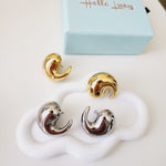 Bold golden studs, chunky golden studs, geometric jewelry, spiral earrings, spiral silver earrings, hearts silver medium earrings, Silver classy earrings, hearts earrings, self love earrings, silver chunky hearts earrings, two tones chunky earrings, hypoallergenic earrings, two tone everyday hoops, 18k gold plated earrings, Waterproof earrings, Silver and gold earrings, Durable earrings, Elegant earrings, Timeless design, aesthetic earrings, timeless earrings, Stylish jewelry, stylish earrings, Versatile je