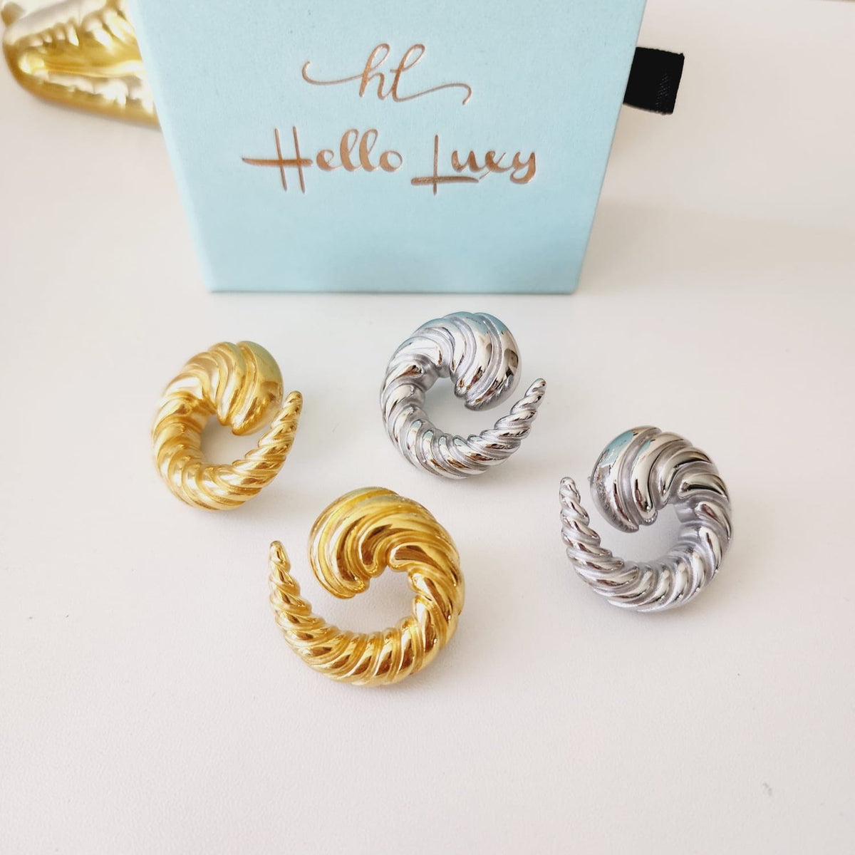 Bold golden studs, chunky golden studs, geometric jewelry, spiral earrings, spiral silver earrings, hearts silver medium earrings, Silver classy earrings, hearts earrings, self love earrings, silver chunky hearts earrings, two tones chunky earrings, hypoallergenic earrings, two tone everyday hoops, 18k gold plated earrings, Waterproof earrings, Silver and gold earrings, Durable earrings, Elegant earrings, Timeless design, aesthetic earrings, timeless earrings, Stylish jewelry, stylish earrings, Versatile je