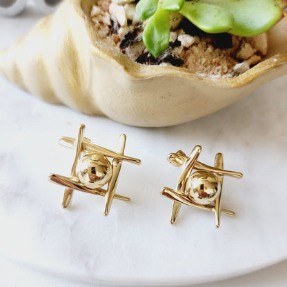 Tic Tac Toe earrings, Geometrical Studs, Spiral Gold earrings, Spiral Bold Earrings, Bold golden studs, chunky golden studs, self love jewelry, self love earrings, hearts silver earrings, hearts silver medium earrings, Silver classy earrings, hearts earrings, self love earrings, silver chunky hearts earrings, two tones chunky earrings, hypoallergenic earrings, two tone everyday hoops, 18k gold plated earrings, Waterproof earrings, Silver and gold earrings, Durable earrings, Elegant earrings, Timeless design