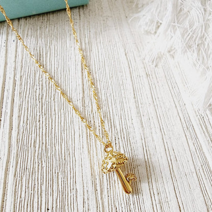 Keywords: Mushroom Gold Necklace, minimalist charm, delicate, simplicity, elegance, understated beauty, dainty pendant, growth, harmony, resilience, water-resistant, high-quality, tarnish-resistant, gold-plated stainless steel, longevity, durability, sleek design, versatile, day to night, casual, formal, must-have accessory, water-resistant, radiant, untarnished, exquisite, thoughtful gift, minimalist beauty.