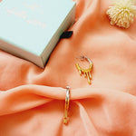 Dripping two tone hoops, geometric two tone earrings, two tone medium earrings, two tone classy earrings, vintage two tone earrings, long lasting two tone earrings, two tone chunky earrings, two tones chunky earrings, hypoallergenic earrings, two tone everyday studs, 18k gold plated earrings, Waterproof earrings, Silver and gold earrings, Durable earrings, Elegant earrings, Timeless design, aesthetic earrings, timeless earrings