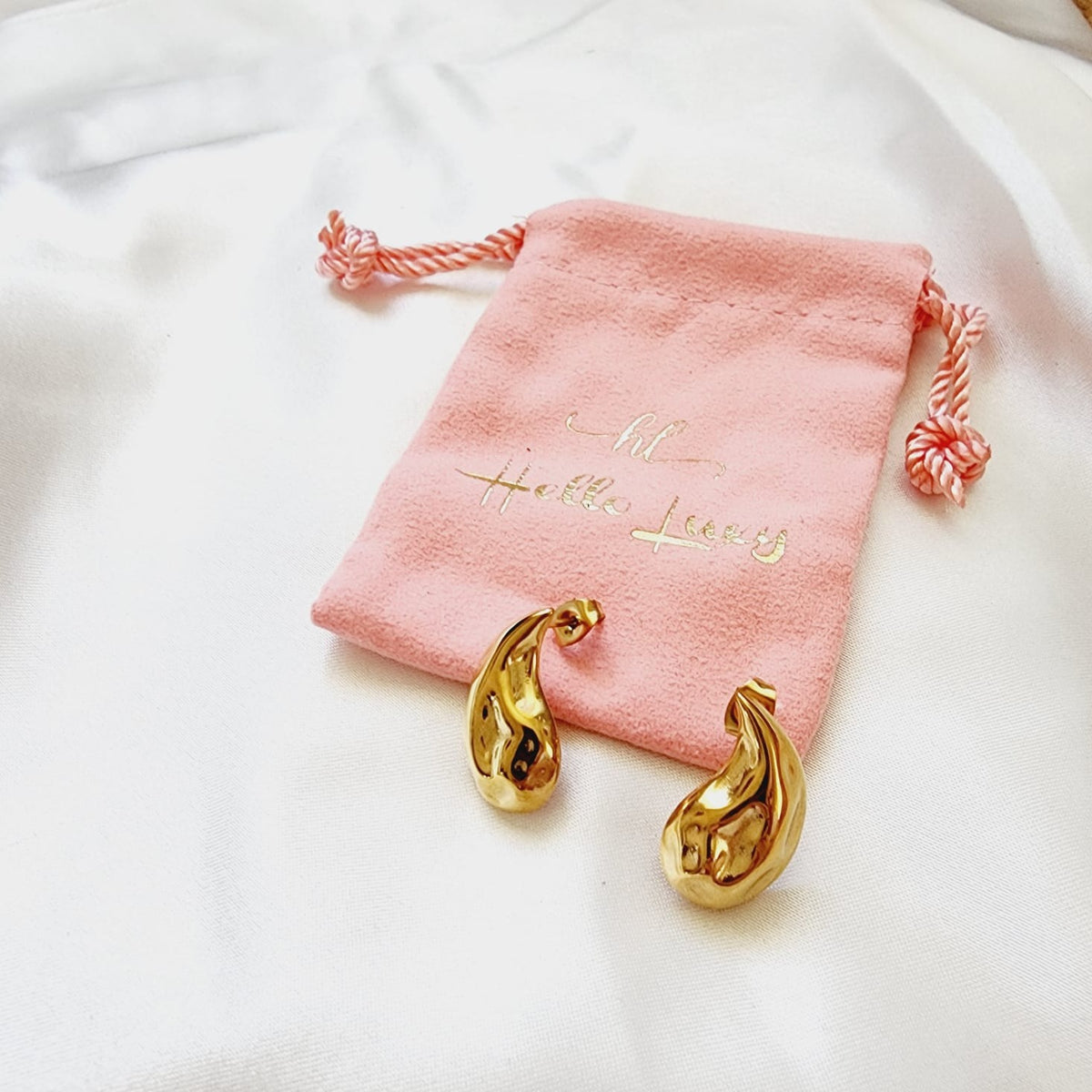 Bold Tear Drop earrings, silver earrings, hypoallergenic earrings, teardrop maxi studs, 18k gold plated earrings, Waterproof earrings, Silver and gold earrings, Durable earrings, Elegant earrings, Timeless design, aesthetic earrings, timeless earrings, Stylish jewelry, stylish earrings, Versatile jewelry, Bold Earrings