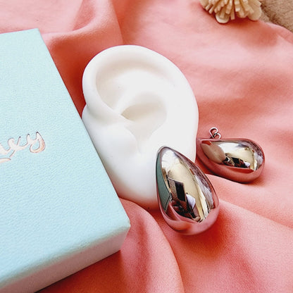 Bold Tear Drop earrings, silver earrings, hypoallergenic earrings, teardrop maxi studs, 18k gold plated earrings, Waterproof earrings, Silver and gold earrings, Durable earrings, Elegant earrings, Timeless design, aesthetic earrings, timeless earrings, Stylish jewelry, stylish earrings, Versatile jewelry, Bold Earrings, chunky earrings, Bottega Tear drop earrings, Bottega Veneta Earrings, Hailey Biber Earrings, Bottega Drop Earrings, Bottega Bold Earrings