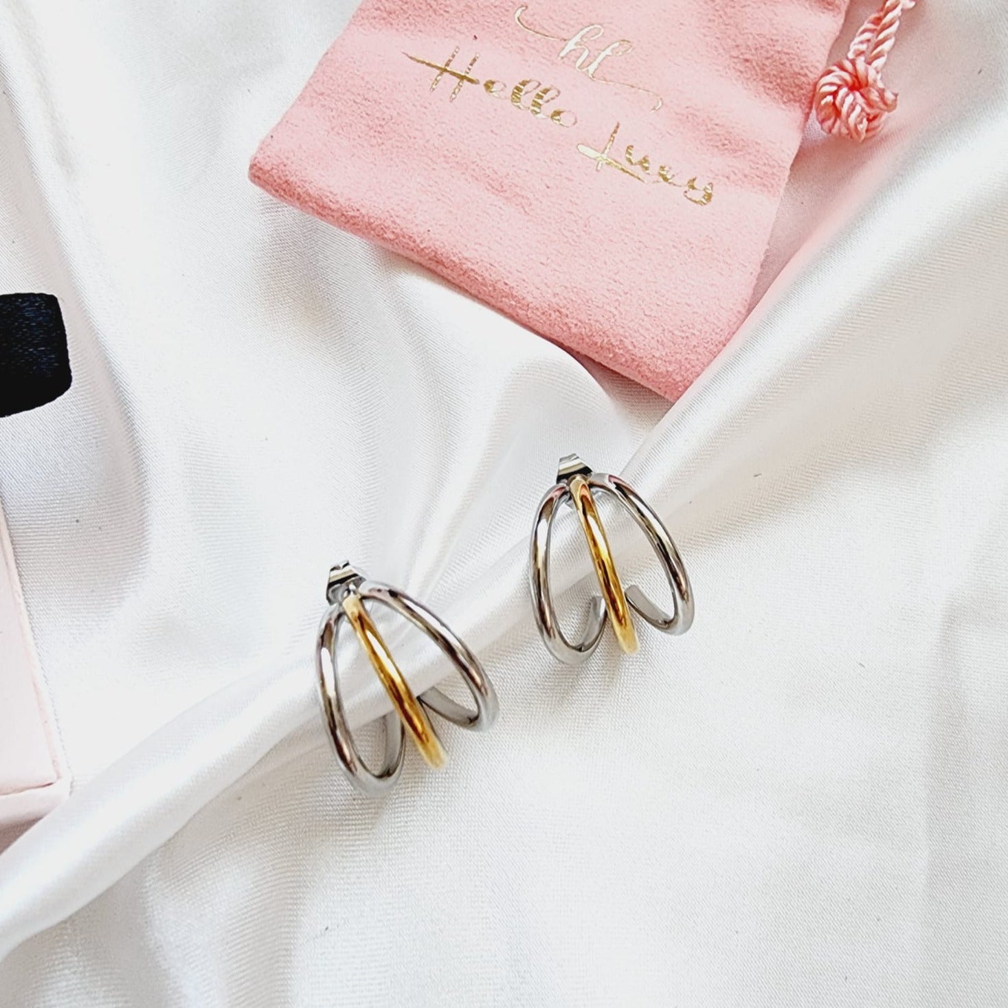 two tone hoops, two tone small earrings, two tone classy earrings, hypoallergenic earrings, two tone everyday hoops, 18k gold plated earrings, Waterproof earrings, Silver and gold earrings, Durable earrings, Elegant earrings, Timeless design, aesthetic earrings, timeless earrings, Stylish jewelry, stylish earrings, Versatile jewelry, Bold Earrings, chunky earrings, Bottega Tear drop earrings, Bottega Veneta Earrings