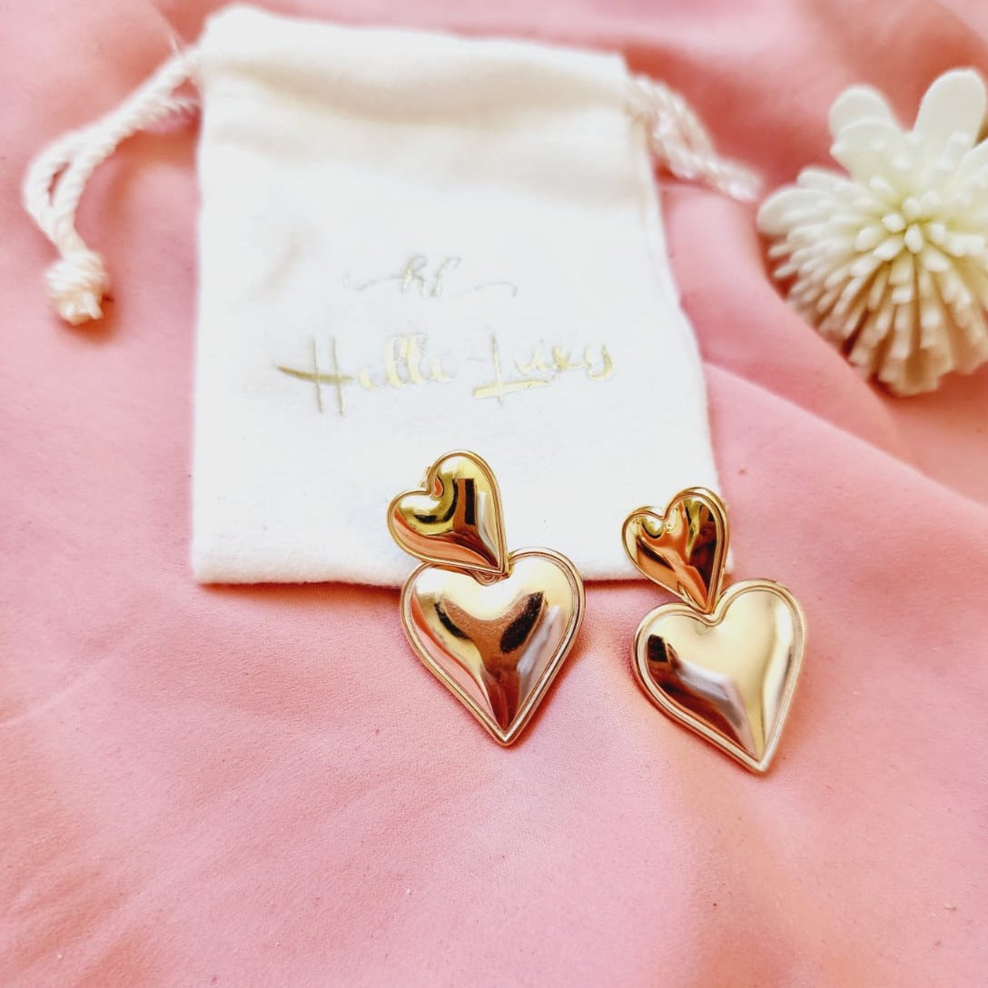 rose gold and gold heart earrings, self love jewelry, self love earrings, hearts silver earrings, hearts silver medium earrings, Silver classy earrings, hearts earrings, self love earrings, silver chunky hearts earrings, two tones chunky earrings, hypoallergenic earrings, two tone everyday hoops, 18k gold plated earrings, Waterproof earrings, Silver and gold earrings