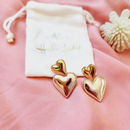 rose gold and gold heart earrings, self love jewelry, self love earrings, hearts silver earrings, hearts silver medium earrings, Silver classy earrings, hearts earrings, self love earrings, silver chunky hearts earrings, two tones chunky earrings, hypoallergenic earrings, two tone everyday hoops, 18k gold plated earrings, Waterproof earrings, Silver and gold earrings