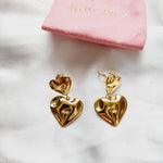 self love jewelry, self love earrings, hearts silver earrings, hearts silver medium earrings, Silver classy earrings, hearts earrings, self love earrings, silver chunky hearts earrings, two tones chunky earrings, hypoallergenic earrings, two tone everyday hoops, 18k gold plated earrings, Waterproof earrings, Silver and gold earrings, Durable earrings, Elegant earrings, Timeless design, aesthetic earrings, timeless earrings, Stylish jewelry, stylish earrings, Versatile jewelry, Bold Earrings, chunky earrings