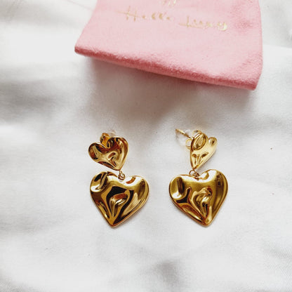 self love jewelry, self love earrings, hearts silver earrings, hearts silver medium earrings, Silver classy earrings, hearts earrings, self love earrings, silver chunky hearts earrings, two tones chunky earrings, hypoallergenic earrings, two tone everyday hoops, 18k gold plated earrings, Waterproof earrings, Silver and gold earrings, Durable earrings, Elegant earrings, Timeless design, aesthetic earrings, timeless earrings, Stylish jewelry, stylish earrings, Versatile jewelry, Bold Earrings, chunky earrings