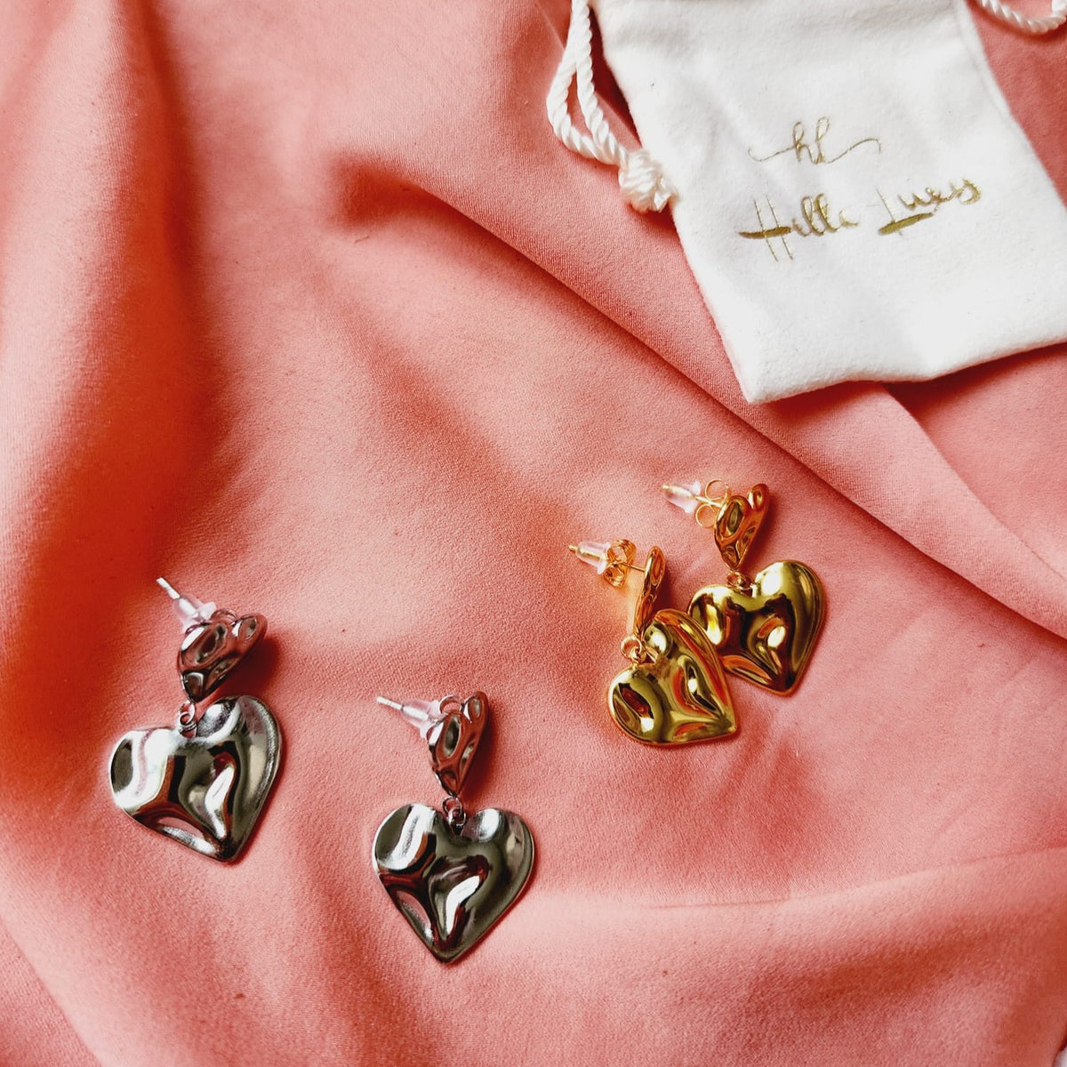 self love jewelry, self love earrings, hearts silver earrings, hearts silver medium earrings, Silver classy earrings, hearts earrings, self love earrings, silver chunky hearts earrings, two tones chunky earrings, hypoallergenic earrings, two tone everyday hoops, 18k gold plated earrings, Waterproof earrings, Silver and gold earrings, Durable earrings, Elegant earrings, Timeless design, aesthetic earrings, timeless earrings, Stylish jewelry, stylish earrings, Versatile jewelry, Bold Earrings, chunky earrings