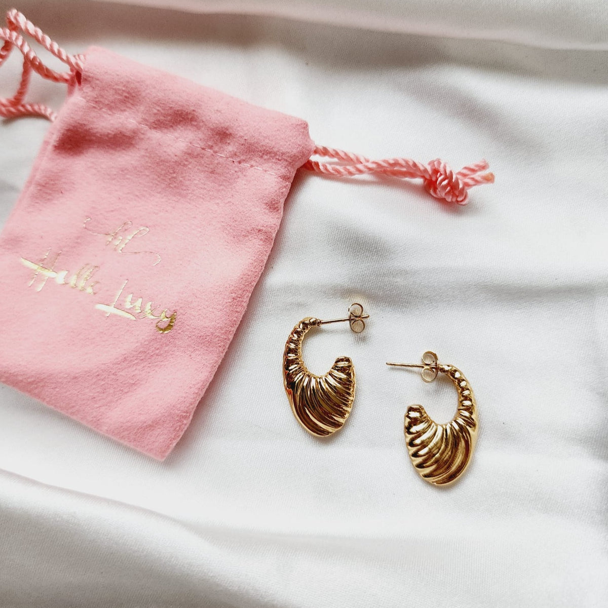 Lightweight hoops, Small Abstract hoops, abstract hoop earrings, hearts silver earrings, hearts silver medium earrings, Silver classy earrings, hearts earrings, self love earrings, silver chunky hearts earrings, two tones chunky earrings, hypoallergenic earrings, two tone everyday hoops, 18k gold plated earrings, Waterproof earrings, Silver and gold earrings, Durable earrings, Elegant earrings, Timeless design, aesthetic earrings, timeless earrings, Stylish jewelry, stylish earrings