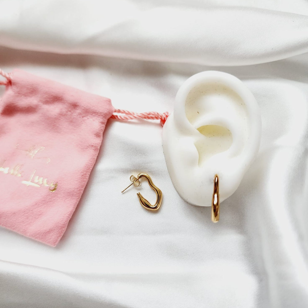 Lightweight hoops, Small Abstract hoops, abstract hoop earrings, hearts silver earrings, hearts silver medium earrings, Silver classy earrings, hearts earrings, self love earrings, silver chunky hearts earrings, two tones chunky earrings, hypoallergenic earrings, two tone everyday hoops, 18k gold plated earrings, Waterproof earrings, Silver and gold earrings, Durable earrings, Elegant earrings, Timeless design, aesthetic earrings, timeless earrings, Stylish jewelry, stylish earrings