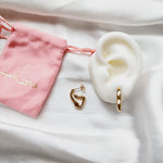 Lightweight hoops, Small Abstract hoops, abstract hoop earrings, hearts silver earrings, hearts silver medium earrings, Silver classy earrings, hearts earrings, self love earrings, silver chunky hearts earrings, two tones chunky earrings, hypoallergenic earrings, two tone everyday hoops, 18k gold plated earrings, Waterproof earrings, Silver and gold earrings, Durable earrings, Elegant earrings, Timeless design, aesthetic earrings, timeless earrings, Stylish jewelry, stylish earrings