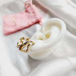 Lightweight hoops, Small Abstract hoops, abstract hoop earrings, hearts silver earrings, hearts silver medium earrings, Silver classy earrings, hearts earrings, self love earrings, silver chunky hearts earrings, two tones chunky earrings, hypoallergenic earrings, two tone everyday hoops, 18k gold plated earrings, Waterproof earrings, Silver and gold earrings, Durable earrings, Elegant earrings, Timeless design, aesthetic earrings, timeless earrings, Stylish jewelry, stylish earrings