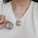 Geometric necklace and earrings, bold circular necklace and earrings, chunky necklace and earrings, infinity necklace and earrings, Fashion Threaded Swirl Shell Pendant Necklace - Steel Stainless Steel Threaded Swirl Shell Necklace, Silver Geometric necklace and earrings, Gold Geometric necklace and earrings  Water Resistant Necklace  Water Resistant Jewelry  Water Resistant  water resistance jewelry