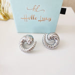 Bold golden studs, chunky golden studs, geometric jewelry, spiral earrings, spiral silver earrings, hearts silver medium earrings, Silver classy earrings, hearts earrings, self love earrings, silver chunky hearts earrings, two tones chunky earrings, hypoallergenic earrings, two tone everyday hoops, 18k gold plated earrings, Waterproof earrings, Silver and gold earrings, Durable earrings, Elegant earrings, Timeless design, aesthetic earrings, timeless earrings, Stylish jewelry, stylish earrings, Versatile je