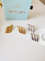 Bold golden studs, bold three tone earrings, bold silver earring, chunky golden studs, geometric jewelry, spiral earrings, spiral silver earrings, hearts silver medium earrings, Silver classy earrings, hearts earrings, self love earrings, silver chunky hearts earrings, two tones chunky earrings, hypoallergenic earrings, two tone everyday hoops, 18k gold plated earrings, Waterproof earrings, Silver and gold earrings, Durable earrings, Elegant earrings, Timeless design, aesthetic earrings, timeless earrings, 