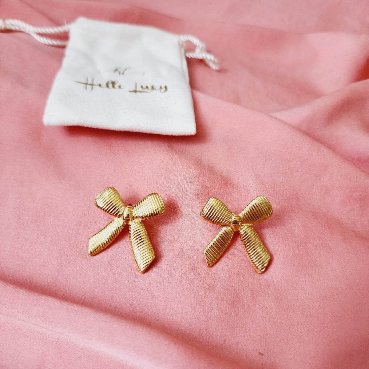 Bow Coquette Earrings, Golden Bow Coquette earrings, Geometrical Studs, Spiral Gold earrings, Spiral Bold Earrings, Bold golden studs, chunky golden studs, self love jewelry, self love earrings, hearts silver earrings, hearts silver medium earrings, Silver classy earrings, hearts earrings, self love earrings, silver chunky hearts earrings, two tones chunky earrings, hypoallergenic earrings, two tone everyday hoops, 18k gold plated earrings, Waterproof earrings, Silver and gold earrings, Durable earrings, El