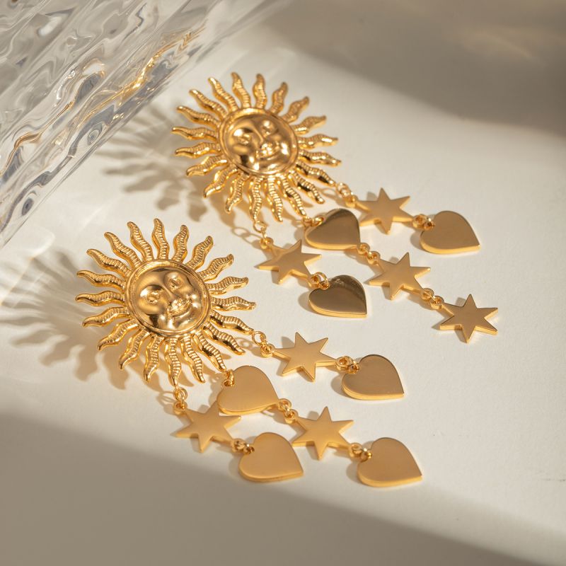 Sun earrings, Gold celestial earrings, Sun and star jewelry, Boho statement earrings,
Unique sun earrings, Sunburst earrings, Celestial jewelry, Star and heart earrings,
Bohemian jewelry style, Gold sun earrings, Dangling celestial earrings, Statement earrings for women, Sun and moon earrings, Vintage-inspired earrings, Spiritual jewelry,
Sun charm earrings, Astrology-inspired jewelry, Durable earrings, Elegant earrings, Timeless design, aesthetic earrings, timeless earrings, Fashion accessories, Stylish je