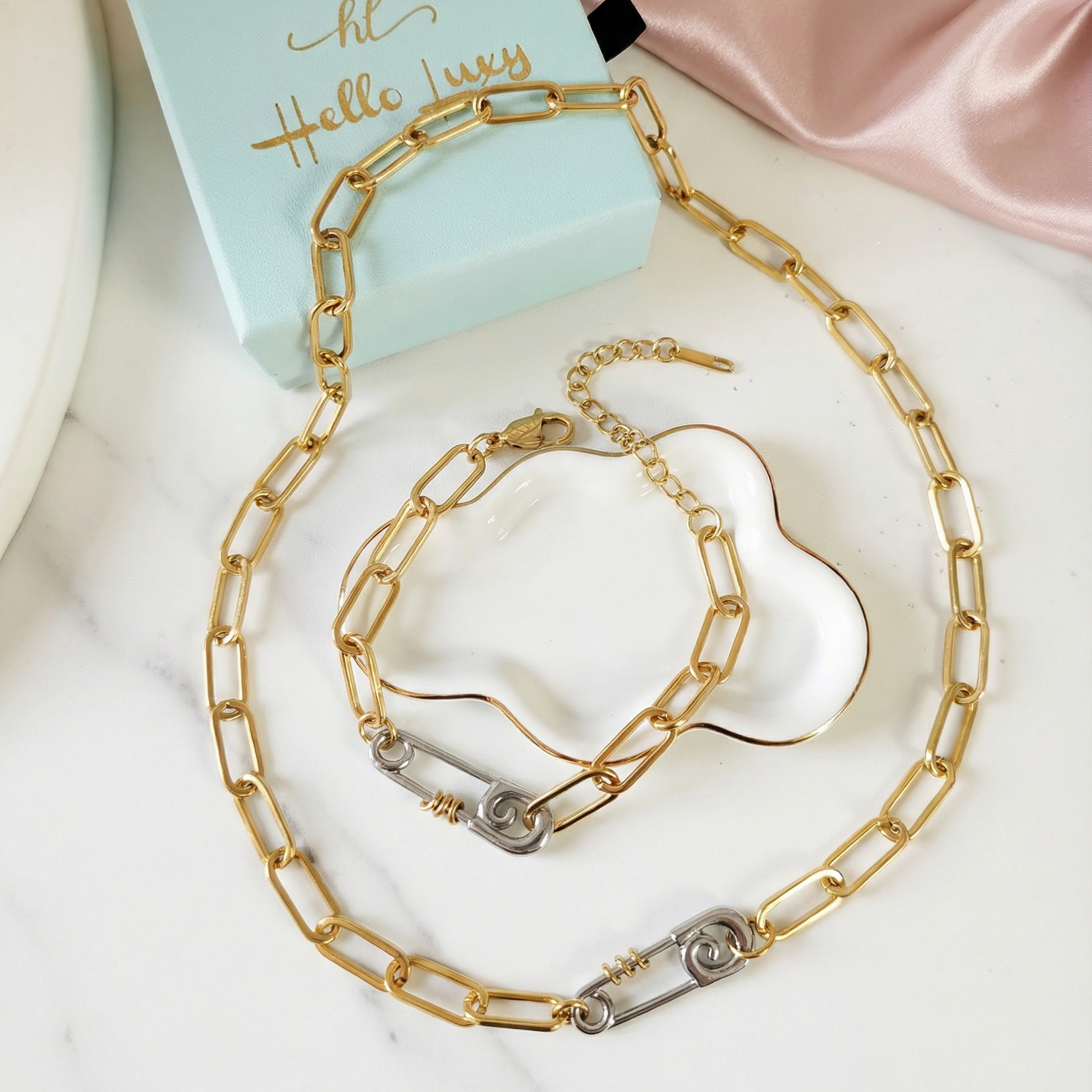 Safety Pin Geometric two tone necklace and bracelet, bold two tone circular necklace and bracelet, chunky two tone necklace and bracelet, infinity necklace and bracelet,  Silver Geometric necklace and bracelets, Gold Geometric necklace and earrings

Water Resistant Necklace

Water Resistant Jewelry

Water Resistant