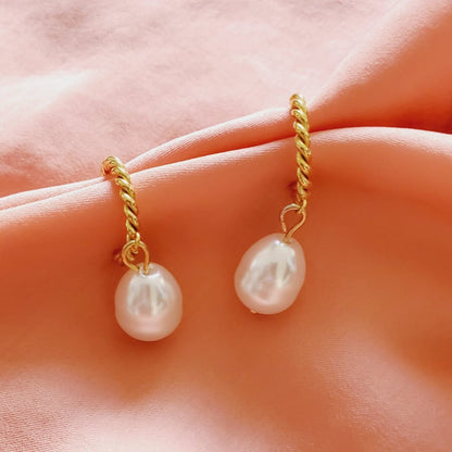 chunky earrings, thick gold hoop, gold hoop earrings, chunky gold hoop, hypoallergenic hoops, gold hoop earring, chunky hoops, small hoop earring, helloluxyjewelry, hoop earrings, croissant earrings, croissant hoops, gold filled hoops, twisted curved hoop, cuban rings, bold earrings, 18k gold earrings, water resistant earrings, Pearl earrings, Pearl hoops,