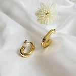 chunky earrings, thick gold hoop, gold hoop earrings, chunky gold hoop, hypoallergenic hoops, gold hoop earring, chunky hoops, small hoop earring, helloluxyjewelry, hoop earrings, croissant earrings, croissant hoops, gold filled hoops, twisted curved hoop, cuban rings, bold earrings, 18k gold earrings, water resistant earrings, chunky hoops, bold earrings