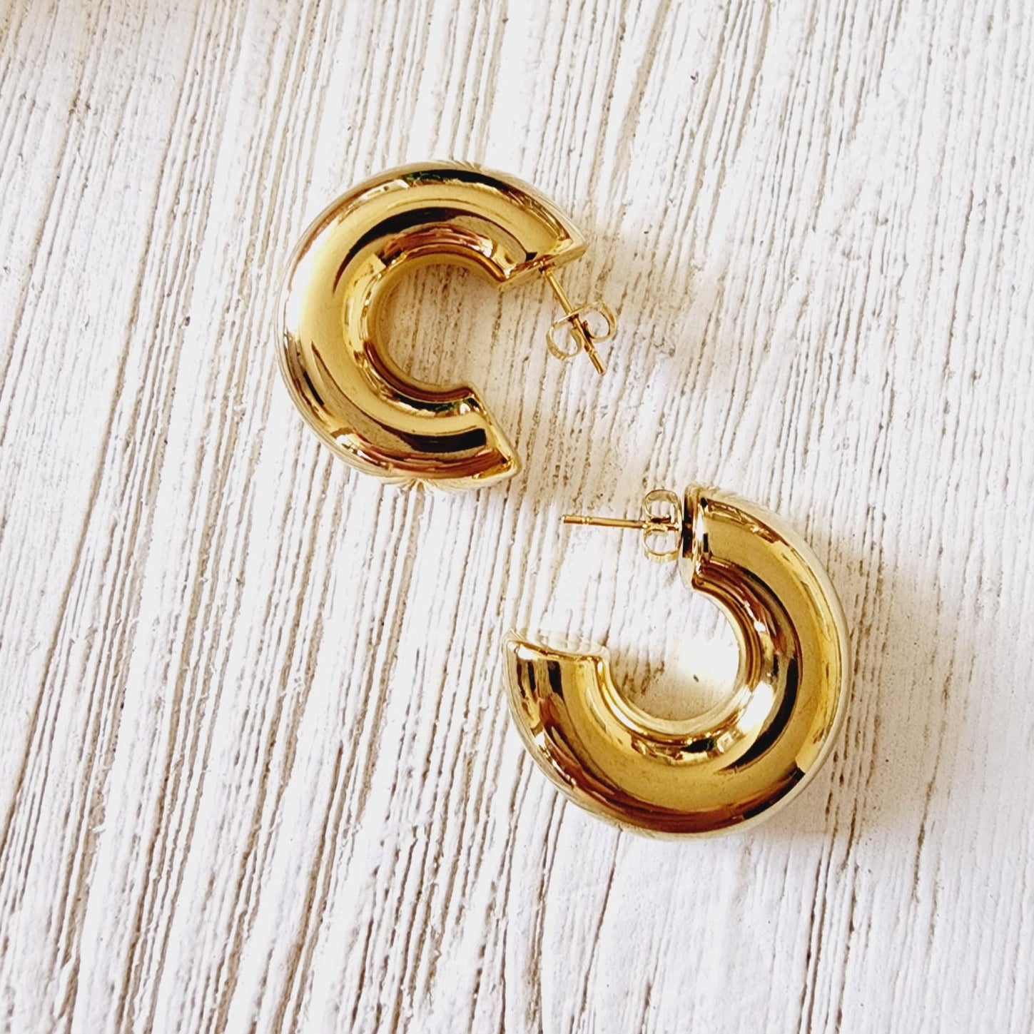 chunky cuban earrings, chunky drop earrings, chunky earrings, thick gold hoop, gold hoop earrings, chunky gold hoop, hypoallergenic hoops, gold hoop earring, chunky hoops, small hoop earring, helloluxyjewelry, hoop earrings, croissant earrings, croissant hoops, gold filled hoops, twisted curved hoop, cuban rings, bold earrings, 18k gold earrings, water resistant earrings, water resistance jewelry