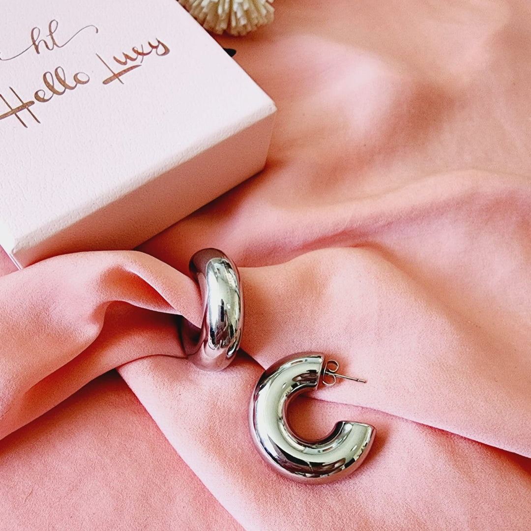 chunky cuban earrings, chunky drop earrings, chunky earrings, thick gold hoop, gold hoop earrings, chunky gold hoop, hypoallergenic hoops, gold hoop earring, chunky hoops, small hoop earring, helloluxyjewelry, hoop earrings, croissant earrings, croissant hoops, gold filled hoops, twisted curved hoop, cuban rings, bold earrings, 18k gold earrings, water resistant earrings, water resistance jewelry