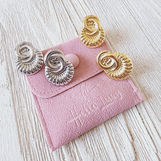 Shell Studs, silver studs, hypoallergenic earrings, Silver shell studs, 18k gold plated earrings, Waterproof earrings, Silver and gold, Durable earrings, Elegant earrings, Timeless design, aesthetic earrings, timeless earrings, Fashion accessories, Stylish jewelry, stylish earrings, Versatile jewelry, Special occasion jewelry, Everyday earrings, Premium quality studs, Affordable luxury, Hypoallergenic earrings waterproof earrings, water resistant earrings, silver studs, gold studs